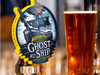 A pint of Adnams Ghost Ship next to an Adnams Ghost Ship pump clip